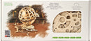 UGears 3D Globe mechanical model kit featuring a wooden globe on a base with gears and an airplane. The kit is designed for self-assembly and educational purposes, showcasing intricate details and a natural finish.