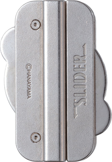 The Cast Slider by Hanayama is a uniquely designed mechanical puzzle featuring a sleek, silver finish. Its compact build includes two main sliding components that challenge users to figure out how to separate them, offering an engaging brain teaser experience. Ideal for puzzle enthusiasts, it combines aesthetic minimalism with complex problem-solving mechanics.