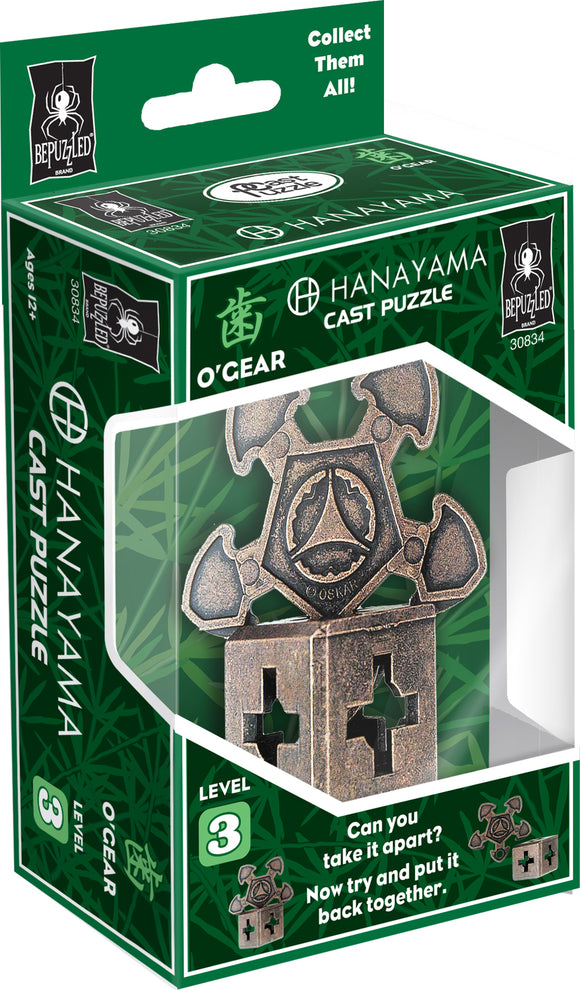 The Cast O'Gear mechanical puzzle by Hanayama features an intricate, metallic design. Packaged in a bright green box with an artistic background and clear display window, the product showcases a level 3 difficulty rating. The design includes a unique geometric shape with notches and curves, challenging the user to disassemble and reassemble it. The text on the box highlights its complexity and encourages players to test their problem-solving skills.