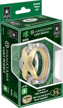 Hanayama Cast Ring Mechanical Puzzle in packaging. The puzzle features intertwined metallic rings in silver and gold, designed for ages 12 and up. It presents a challenging level 4 difficulty, encouraging users to take it apart and reassemble it. The box showcases a bamboo-themed background and includes a 'Collect Them All!' tagline.
