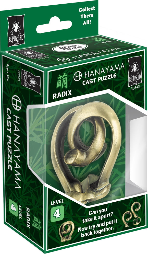 The Hanayama Cast Radix puzzle features a complex, intertwined design made of a shiny bronze-like material. It is packaged in a green box displaying its name and level 4 difficulty, with images of the puzzle at different angles. The box includes instructions that challenge users to take the puzzle apart and reassemble it.