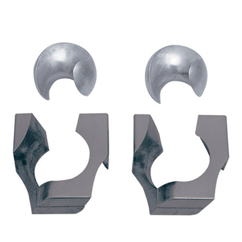 A close-up image of the Cast Marble mechanical puzzle by Hanayama, featuring two intricately designed metallic pieces. One piece is a curved shell shape, while the other has angular grooves, showcasing a combination of polished and matte finishes. The puzzle is designed to interlock perfectly, challenging users to separate and reassemble the pieces, providing an engaging brain-teaser experience.