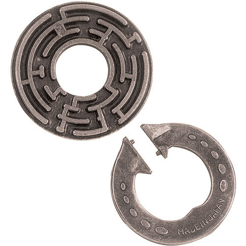 The Cast Labyrinth mechanical puzzle by Hanayama features a circular design with intricate maze pathways etched into its surface. Accompanying it is a puzzle piece shaped like an arrow, designed to maneuver through the labyrinth. The puzzle is crafted from durable metal and showcases a textured finish, perfect for stimulating brain activity as users attempt to solve it by guiding the piece through the maze.