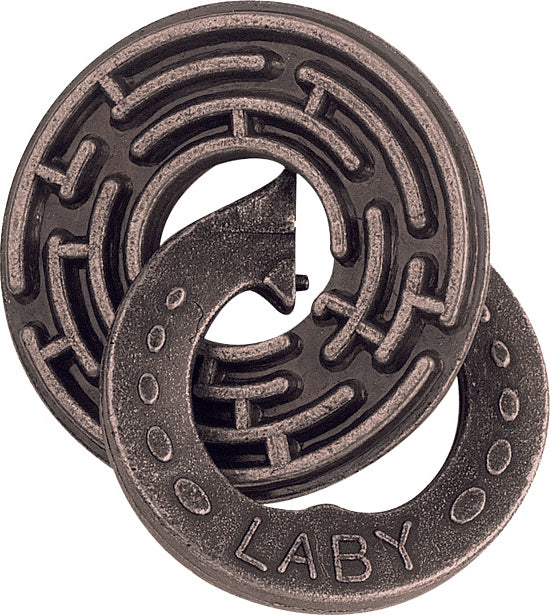 The Cast Labyrinth puzzle by Hanayama, featuring a circular design with a labyrinth pattern. It has a unique mechanical structure, made of durable metal, offering a captivating challenge for puzzle enthusiasts. The piece exhibits a fusion of art and engineering, highlighting intricate details.