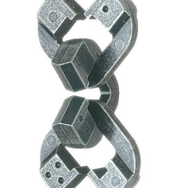 A detailed view of the Hanayama Cast Chain mechanical puzzle. The puzzle features interconnecting chain links made of durable metal, highlighting geometric shapes and unique designs. Ideal for puzzle enthusiasts and those seeking a challenging brain teaser, this puzzle encourages spatial reasoning and problem-solving skills.
