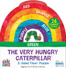 The Very Hungry Caterpillar Floor Puzzle by Briarpatch Inc features an engaging rainbow design with vibrant colors including red, orange, yellow, green, blue, purple, and a friendly caterpillar illustration. This jigsaw puzzle contains 26 giant pieces, measuring approximately 3 feet by 2 feet, suitable for children aged 3 and up, encouraging both cognitive development and interactive play.