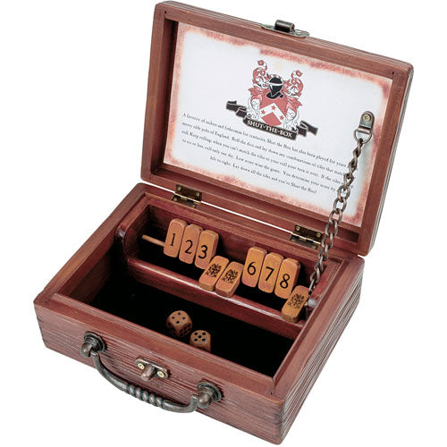 Shut the Box Circa Edition game by Front Porch Classics, featuring a decorative wooden box with a hinged lid, dice, and numbered tiles arranged inside. The box is elegantly crafted with a vintage design, showcasing a classic gameplay mechanism.