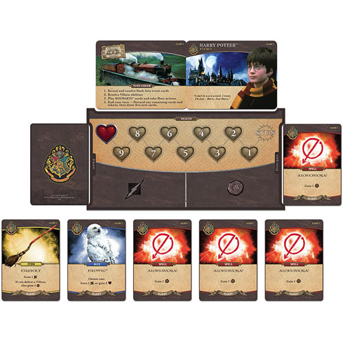 Harry Potter: Hogwarts Battle game by USAopoly displayed with cards including spells, items, and characters. The game board features a player marker, health tracker, and a Hogwarts crest, enhancing the immersive magical experience for fans.