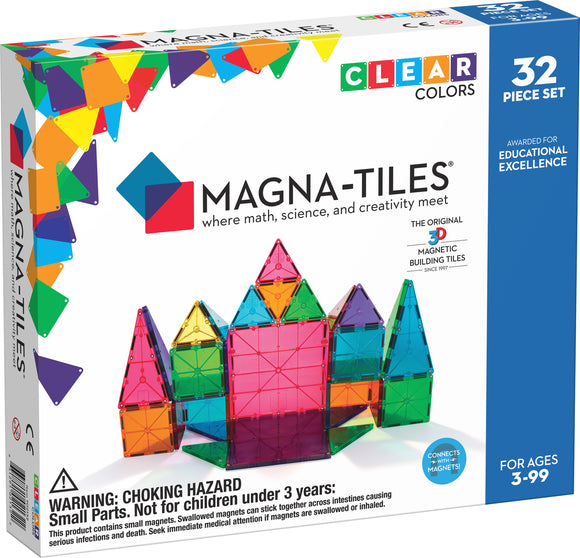 Magna Tiles Clear Colors 32 Piece Set, featuring colorful, translucent magnetic building tiles arranged to form a castle. The box showcases the product's educational focus on math, science, and creativity, perfect for ages 3 to 99.