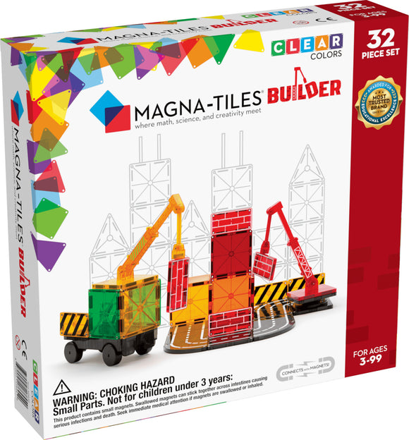 A colorful box of Magna Tiles Builder - 32 Piece Set, featuring clear colored tiles, construction cranes, and warning labels. The design emphasizes creativity, math, and science learning for ages 3 to 99.