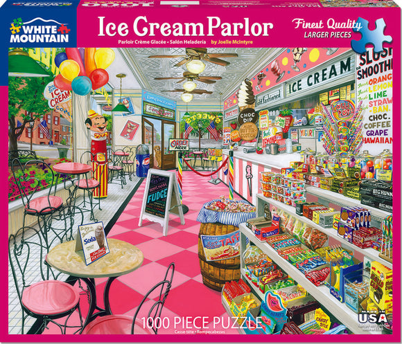 The Ice Cream Parlor jigsaw puzzle by White Mountain Puzzles features a vibrant and detailed illustration of a retro ice cream shop. The scene includes colorful balloons, vintage decor, and an array of ice cream flavors and candy options. Round tables with pink tabletops and decorative chairs complement the cheerful atmosphere. The puzzle contains 1000 pieces, making it a delightful challenge for puzzle enthusiasts.