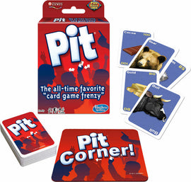 The game Pit by Winning Moves displayed with its colorful packaging and various game cards. The box features bold blue and red design with the title 'Pit' and the tagline 'The all-time favorite card game frenzy.' Scattered around the box are game cards, including images of a bear, cocoa, gold, and a bull, creating an engaging and energetic game atmosphere.