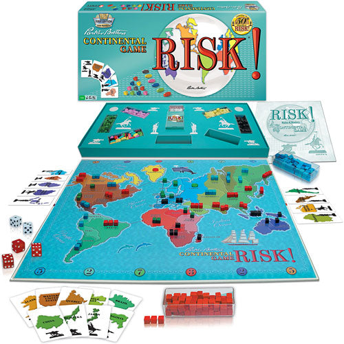 The Risk board game by Winning Moves features a colorful world map with various territory regions. The game box is displayed at the top and includes game pieces like armies, dice, and cards laid out on the board. Players strategize to conquer territories as they engage in global domination over the map, emphasizing tactical gameplay.
