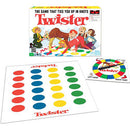 Twister game by Winning Moves featuring a colorful mat with red, yellow, green, and blue circles. Includes a spinner indicating body placements for left hand and foot. The box showcases people tangled in positions, highlighting the fun and playful nature of the game.