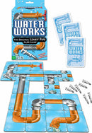 Waterworks card game by Winning Moves featuring a colorful box design and cards. The game includes a layout of leaky pipes and metal wrenches, making it a fun family game for ages 8 and up. Players aim to fix their pipes while avoiding leaks.